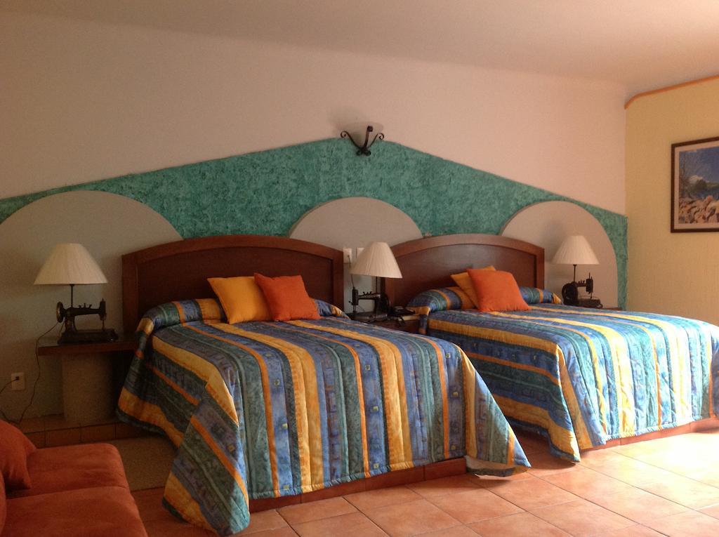 Hotel Plaza Rubio Amatitan Номер фото